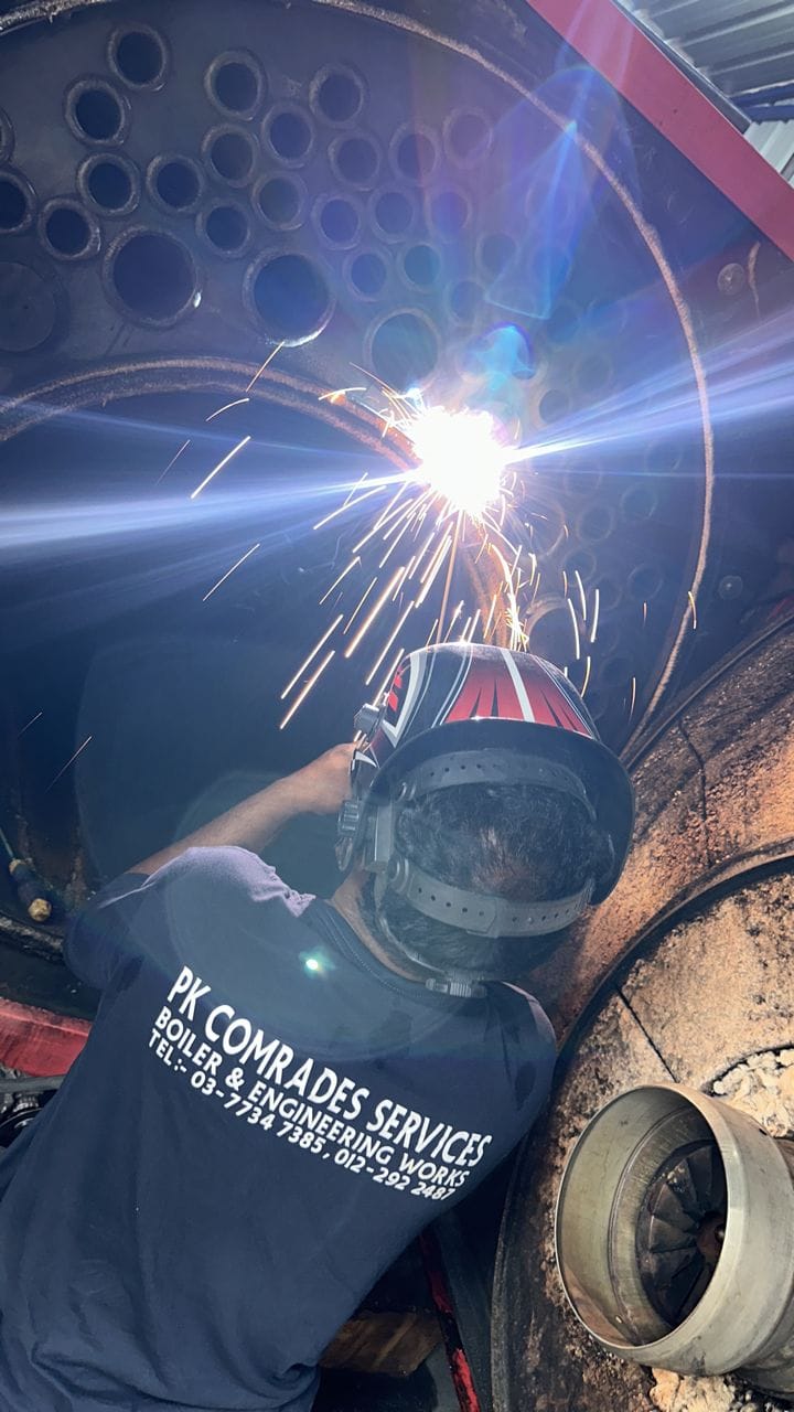 PK Comrades boiler re-tubing workshop — certified welding and pressure part repair Malaysia